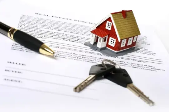 Fine prints on a real estate employment contract