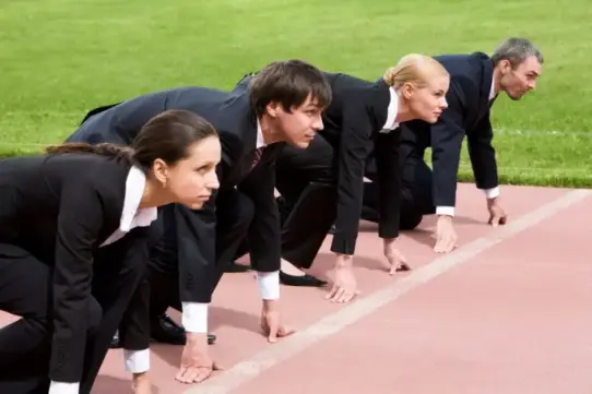 Students preparing to sprint